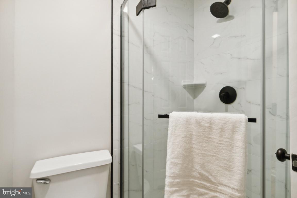 2241 Lovedale Lane, Unit D Reston, VA 20191 - Photo 20 of 31 a bathroom with a shower