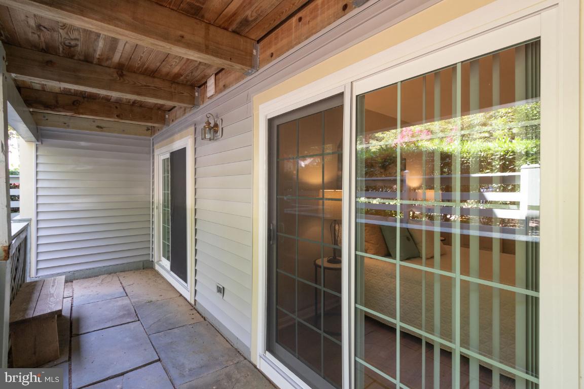 2241 Lovedale Lane, Unit D Reston, VA 20191 - Photo 29 of 31 a view of a door with a door and wooden floor