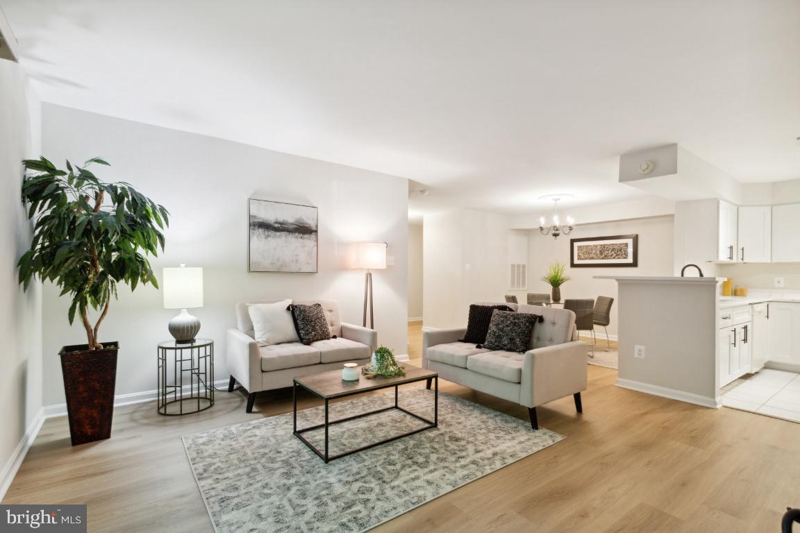 2241 Lovedale Lane, Unit D Reston, VA 20191 - Photo 30 of 31 a living room with furniture and a couch