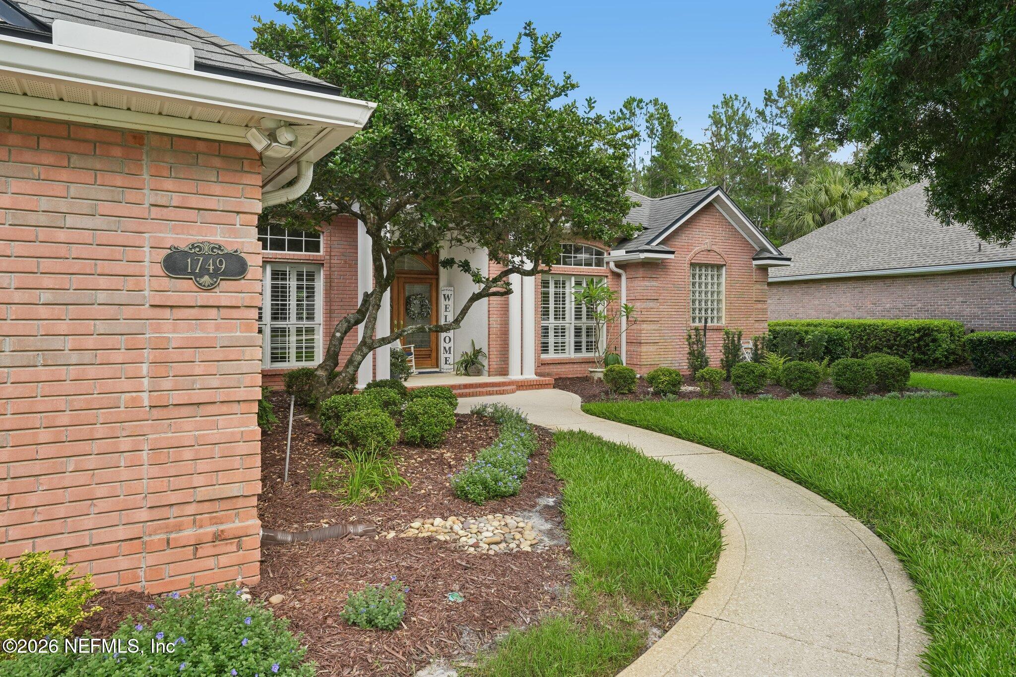 1749 Preserve Point Terrace Fleming Island, FL 32003 - Photo 5 of 60 Front Walk Way