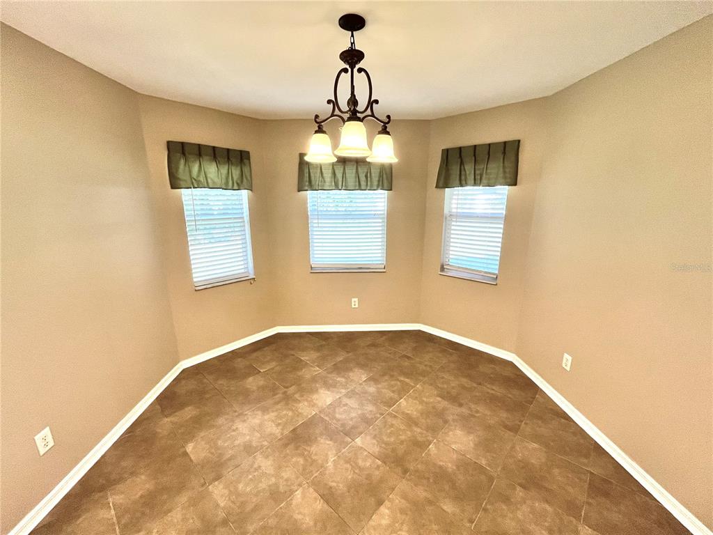 32 Porter Lane Palm Coast, FL 32164 - Photo 13 of 28 a view of an empty room and window