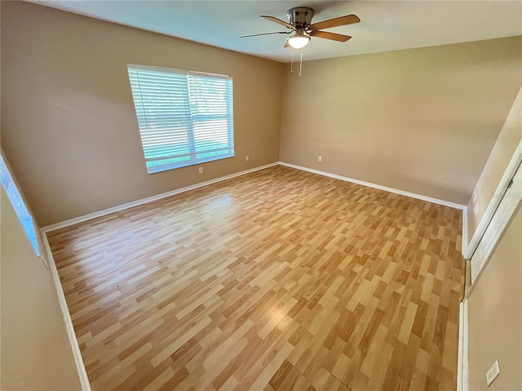 32 Porter Lane Palm Coast, FL 32164 - Photo 15 of 28 a view of an empty room with a window