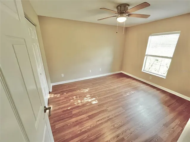 a view of a door and a window