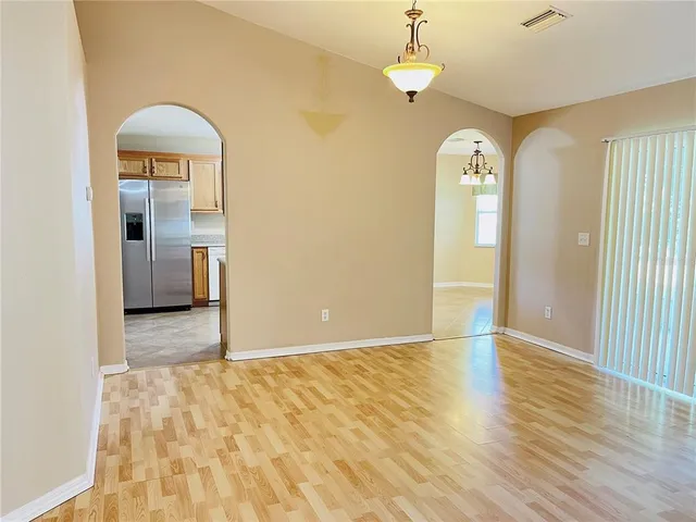 a view of a kitchen with a sink