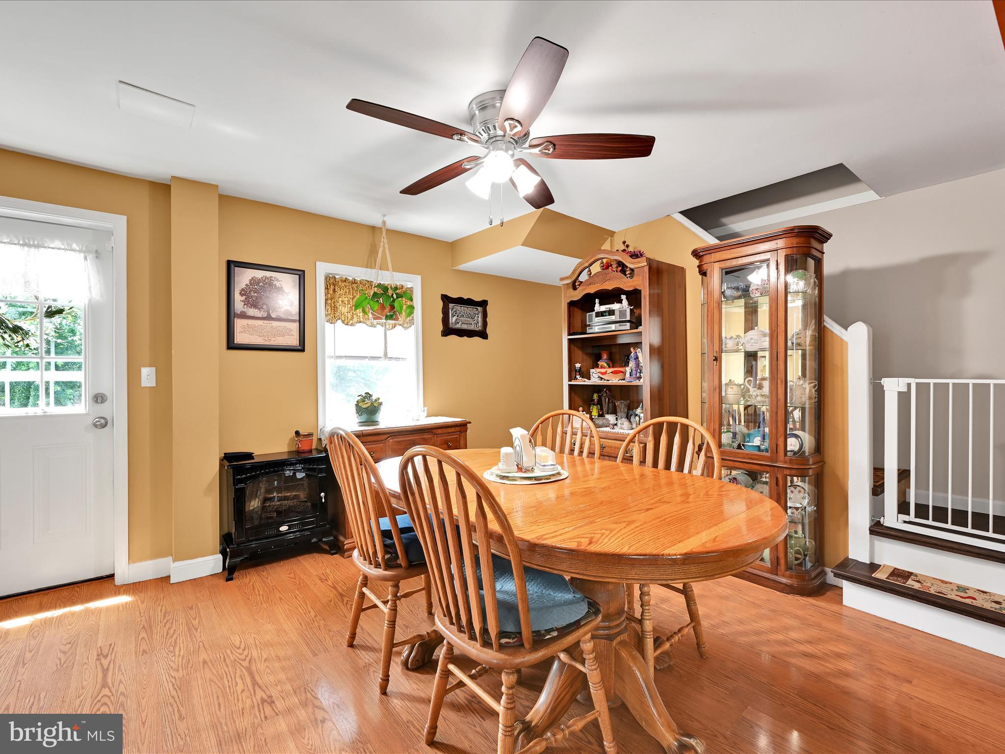 5 Hershey Road Lititz, PA 17543 - Photo 11 of 32 a view of a dining room with furniture and a chandelier
