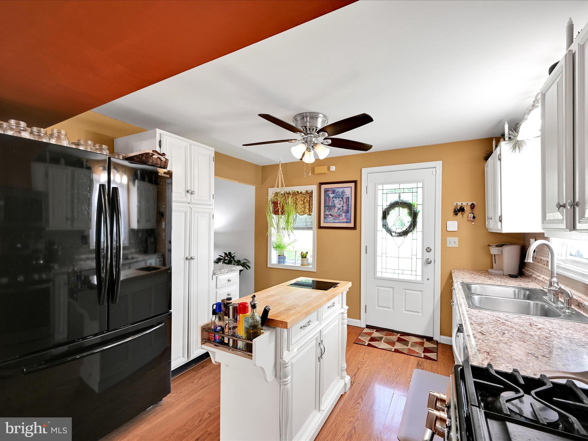 5 Hershey Road Lititz, PA 17543 - Photo 13 of 32 a kitchen with stainless steel appliances granite countertop a refrigerator and a stove top oven
