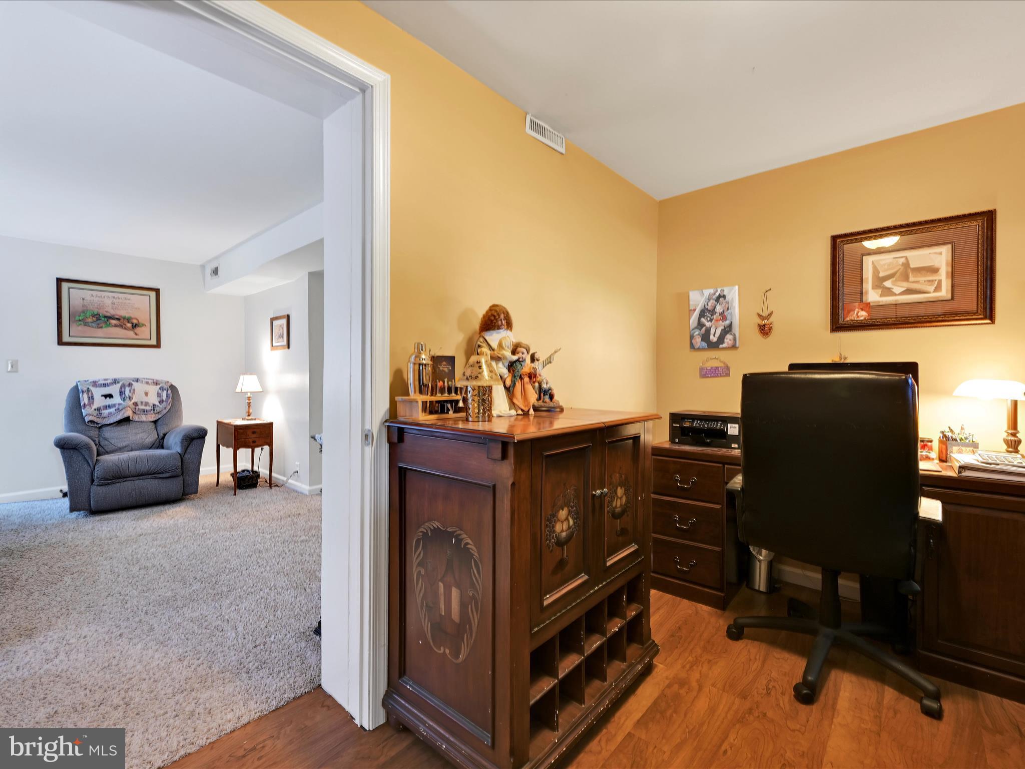 5 Hershey Road Lititz, PA 17543 - Photo 20 of 32 a view of a workspace with furniture and a couch