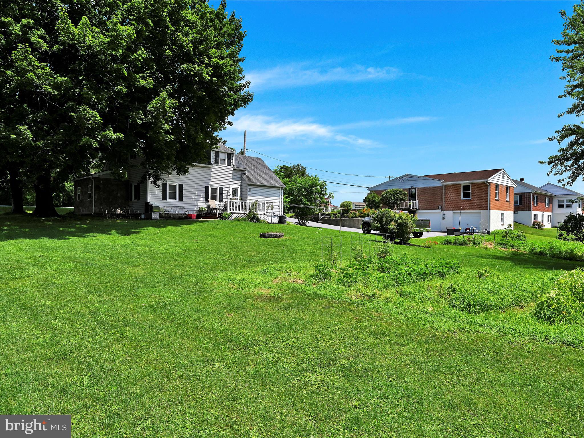 5 Hershey Road Lititz, PA 17543 - Photo 27 of 32 a front view of a house with garden
