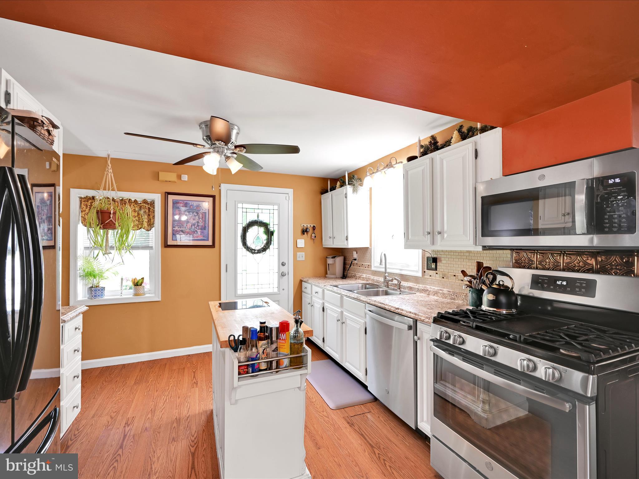 5 Hershey Road Lititz, PA 17543 - Photo 3 of 32 a kitchen with a stove a sink and a refrigerator