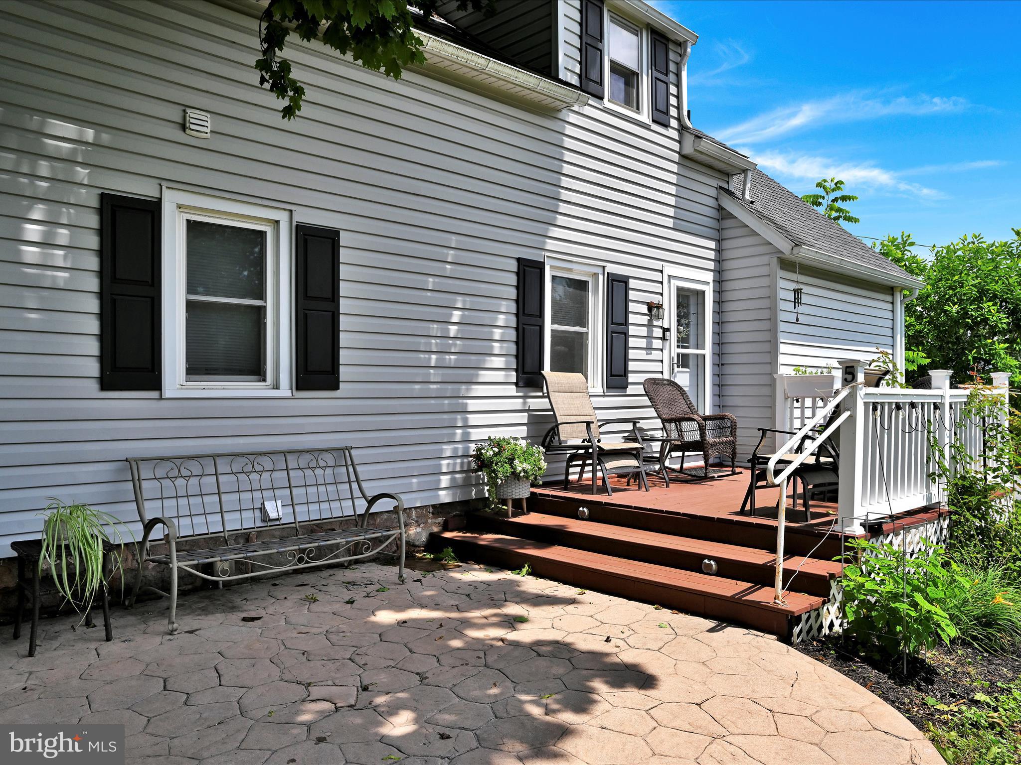 5 Hershey Road Lititz, PA 17543 - Photo 6 of 32 a backyard of a house with wooden fence and a bench