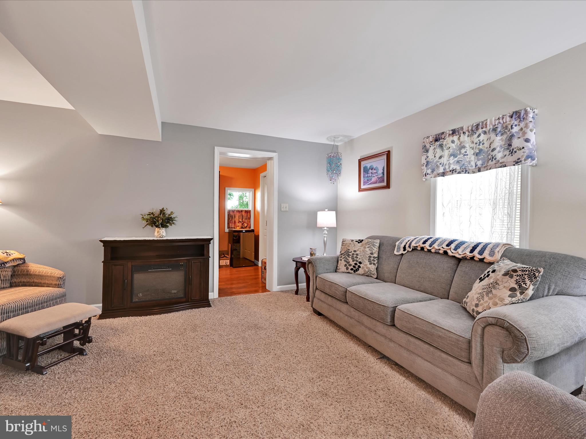 5 Hershey Road Lititz, PA 17543 - Photo 8 of 32 a living room with furniture and a fireplace