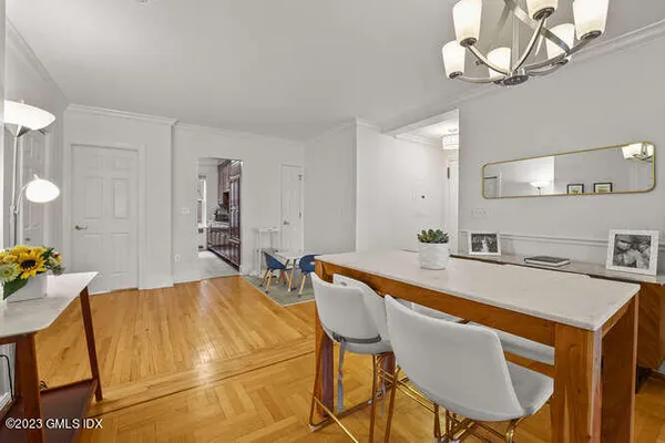 a view of a dining room and kitchen