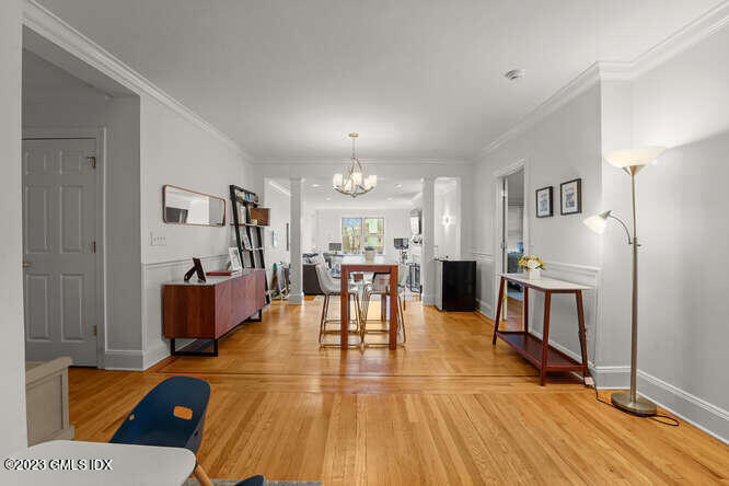 25 West Elm Street, Unit 40 Greenwich, CT 06830 - Photo 8 of 25 a living room with furniture and a wooden floor