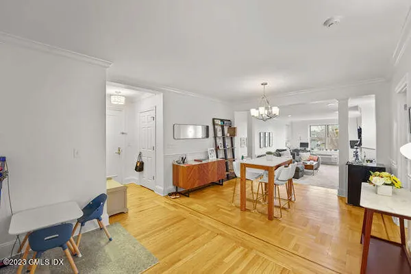 a living room with furniture and a table