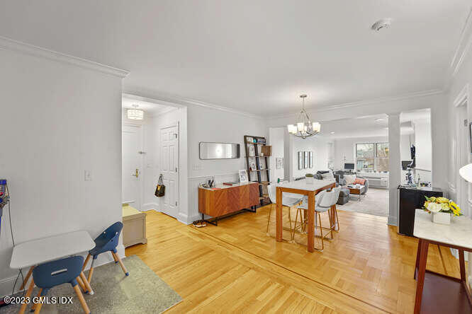 25 West Elm Street, Unit 40 Greenwich, CT 06830 - Photo 10 of 25 a living room with furniture and a table
