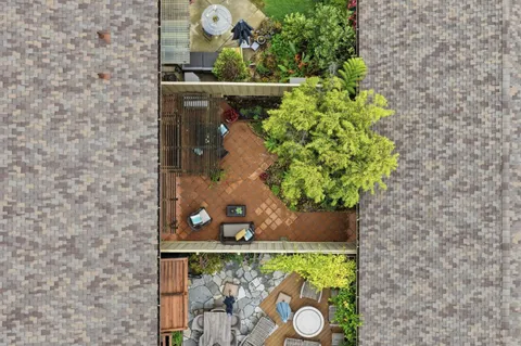 a view of a swimming pool with an outdoor seating