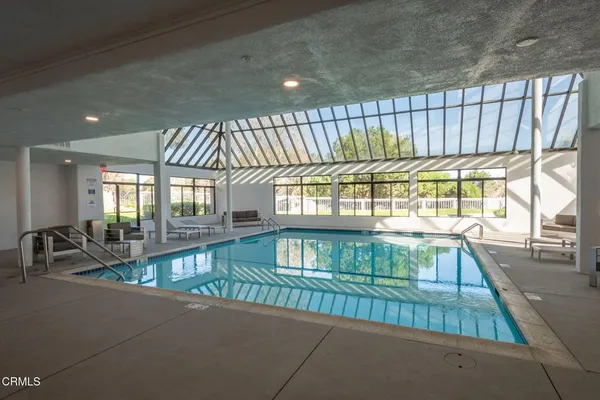 a view of an entryway with a floor to ceiling window