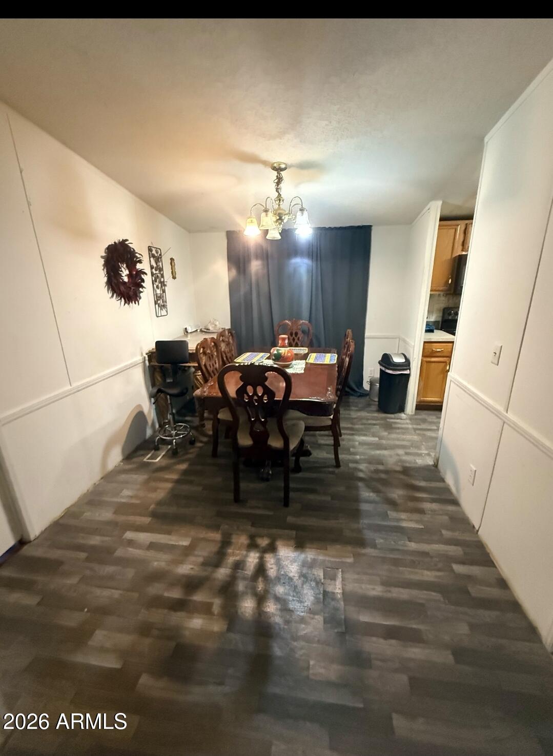 2625 Saddle Vista Road Tonopah, AZ 85354 - Photo 17 of 19 a dining room with furniture and wooden floor