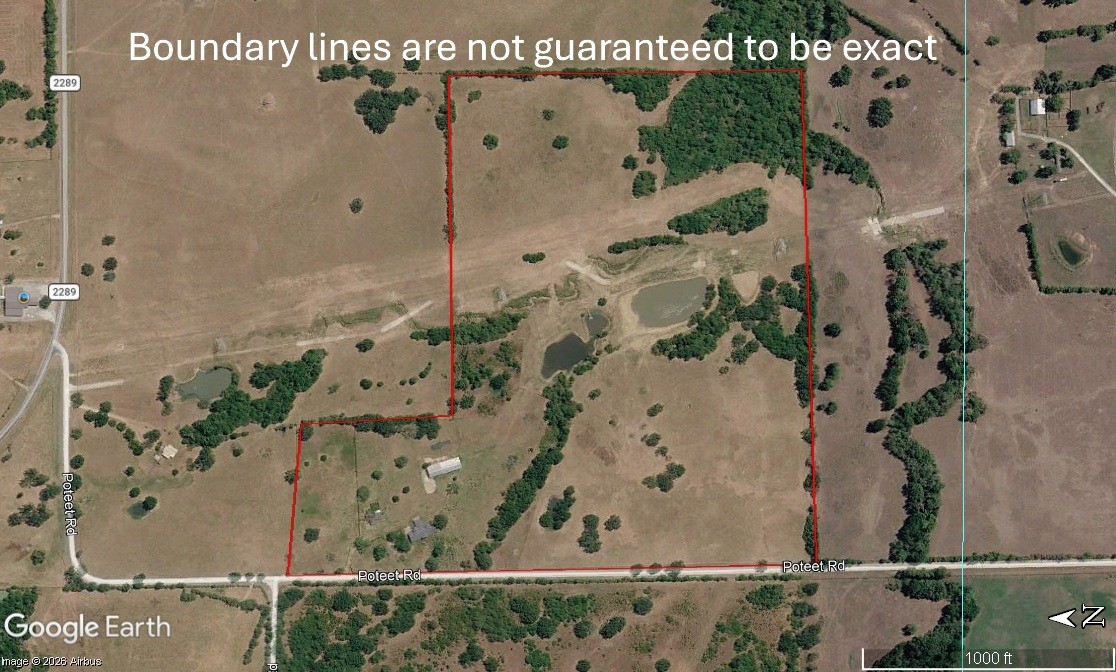 4442 Poteet Road Normangee, TX 77871 - Photo 41 of 49 an aerial view of a house with a mountain