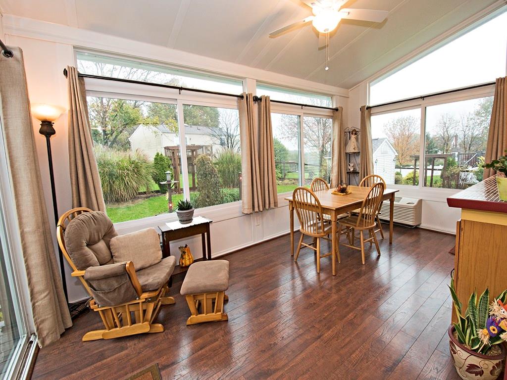 313 Quail Ridge Court Gibsonia, PA 15044 - Photo 2 of 15 LARGE Morning Room, currently being used as a Dining Room and Sitting Area. Gorgeous Windows overlook the Fenced in Backyard. Enjoy the Outdoors, even when you're inside, all year long!