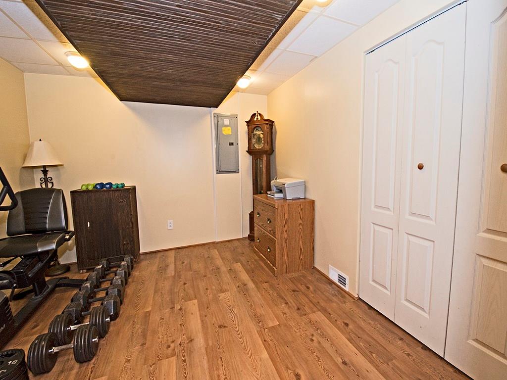 313 Quail Ridge Court Gibsonia, PA 15044 - Photo 4 of 15 Den downstairs has a Closet- and could be used as a guest room, office, den, etc., etc....Very Versatile!
