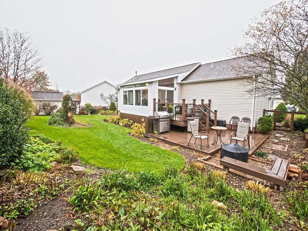 313 Quail Ridge Court Gibsonia, PA 15044 - Photo 6 of 15 Fenced in Backyard and new Trex Decking. Also has a Fire Pit AND Raised Flower Beds! Perfect for Entertaining!!