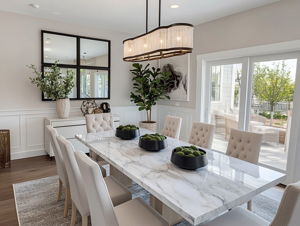 6 Rivendell Lane Millis, MA 02054 - Photo 10 of 33 a kitchen table with chairs and a large window