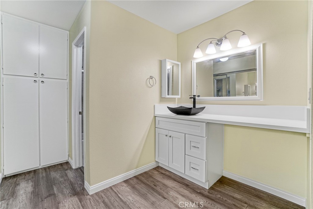 8650 Gulana Avenue Playa del Rey, CA 90293 - Photo 16 of 46 a bathroom with a sink and a mirror