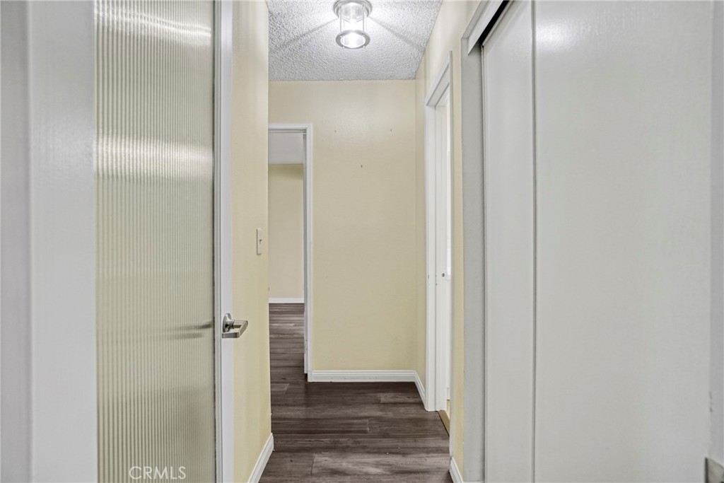 8650 Gulana Avenue Playa del Rey, CA 90293 - Photo 19 of 46 a view of a hallway with wooden floor