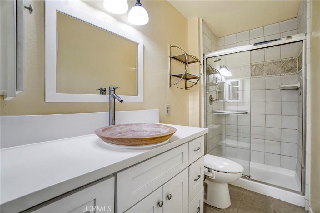 8650 Gulana Avenue Playa del Rey, CA 90293 - Photo 21 of 46 a bathroom with a sink and a mirror