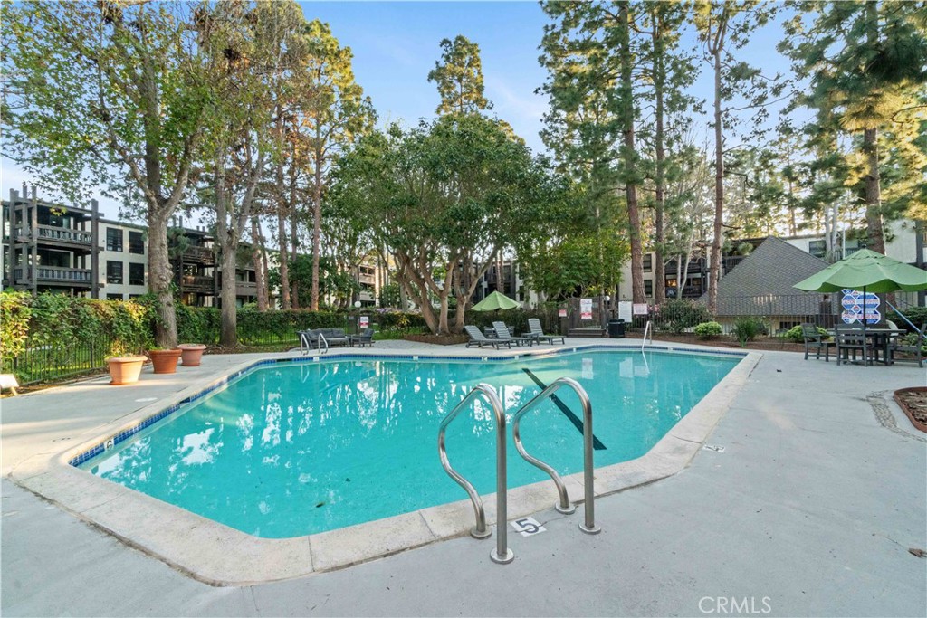 8650 Gulana Avenue Playa del Rey, CA 90293 - Photo 36 of 46 a view of a swimming pool with a patio