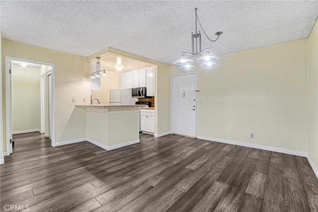 8650 Gulana Avenue Playa del Rey, CA 90293 - Photo 8 of 46 a view of a kitchen with a sink and cabinet wooden floor