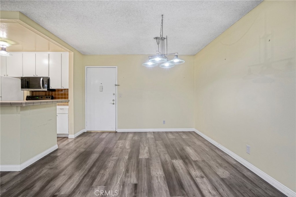 8650 Gulana Avenue Playa del Rey, CA 90293 - Photo 9 of 46 a view of a kitchen with microwave and stove