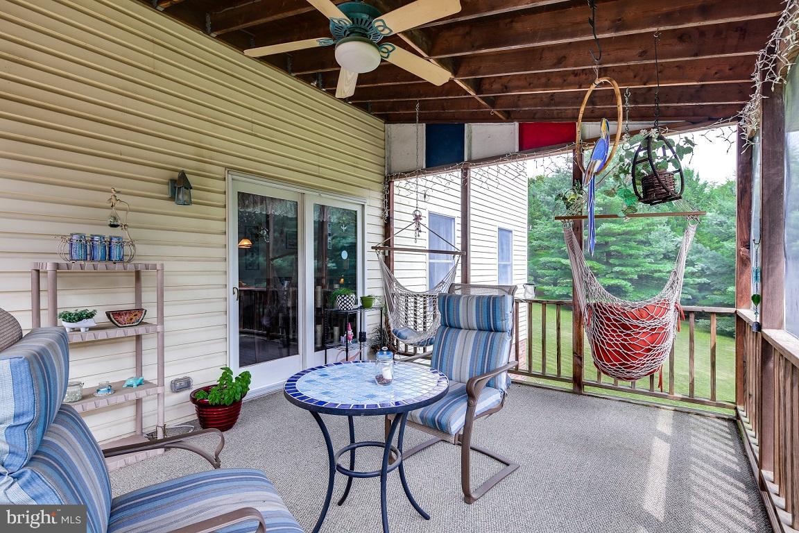 1079 Huntfield Road Westminster, MD 21157 - Photo 11 of 43 Screened Porch off Kitchen