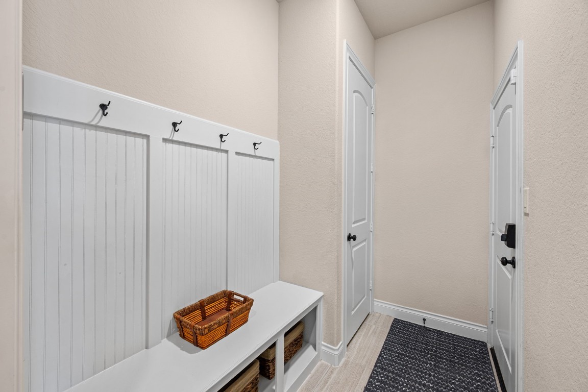 1607 Dove Ridge Drive Katy, TX 77493 - Photo 17 of 38 a view of room with hardwood flooring and staircase