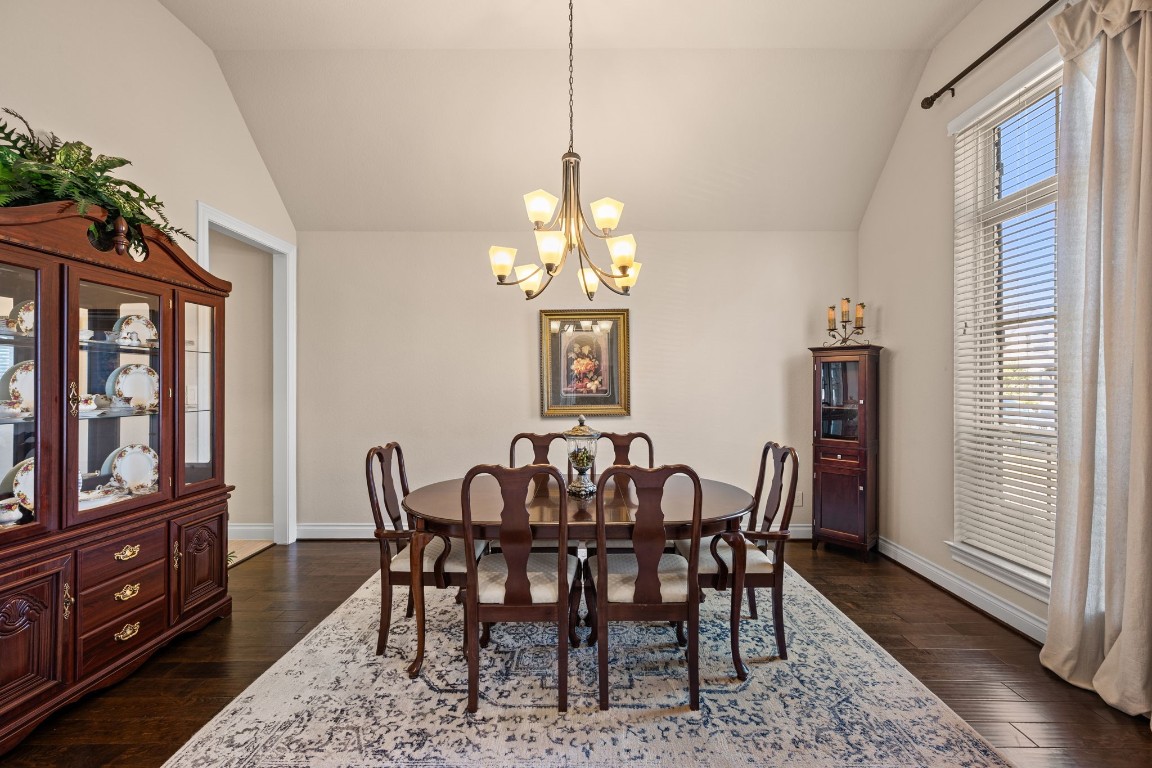 1607 Dove Ridge Drive Katy, TX 77493 - Photo 18 of 38 a view of a dining room with furniture window and wooden floor