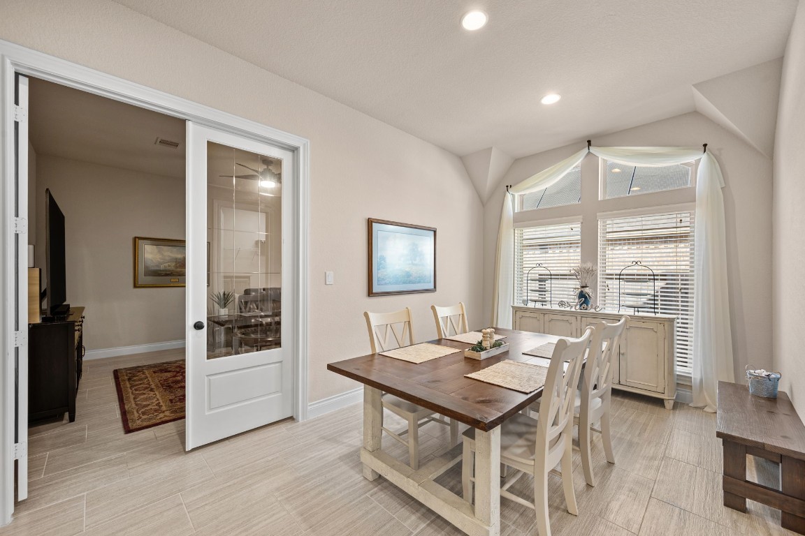1607 Dove Ridge Drive Katy, TX 77493 - Photo 21 of 38 a view of a dining room with furniture and window