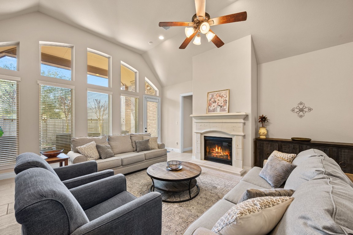 1607 Dove Ridge Drive Katy, TX 77493 - Photo 3 of 38 a living room with furniture and a fireplace