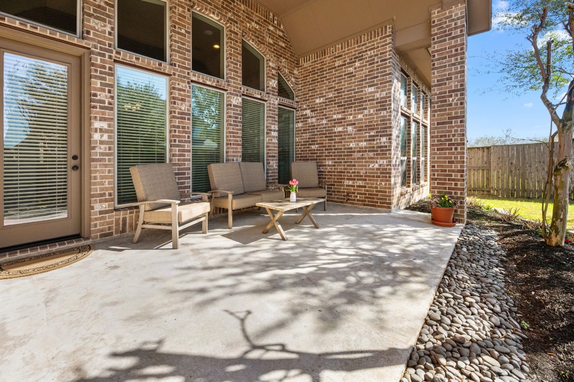 1607 Dove Ridge Drive Katy, TX 77493 - Photo 34 of 38 a view of a outdoor space with a patio