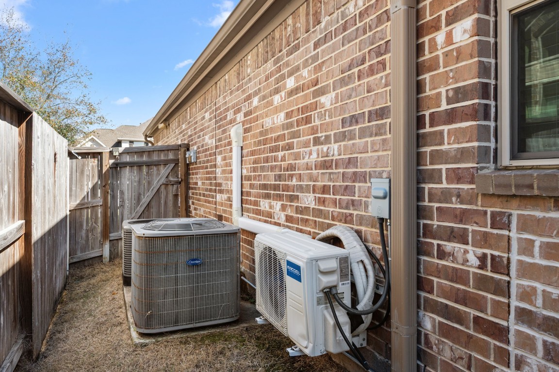 1607 Dove Ridge Drive Katy, TX 77493 - Photo 36 of 38 a view of a storage & utility room