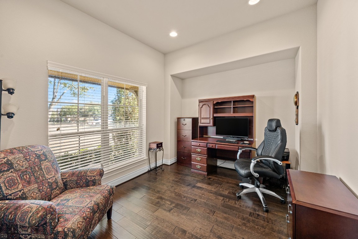 1607 Dove Ridge Drive Katy, TX 77493 - Photo 7 of 38 a livingroom with workspace and a window