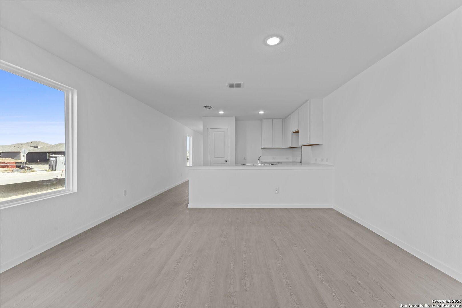 2067 Powell Place Converse, TX 78109 - Photo 14 of 22 a view of kitchen and kitchen with wooden floor