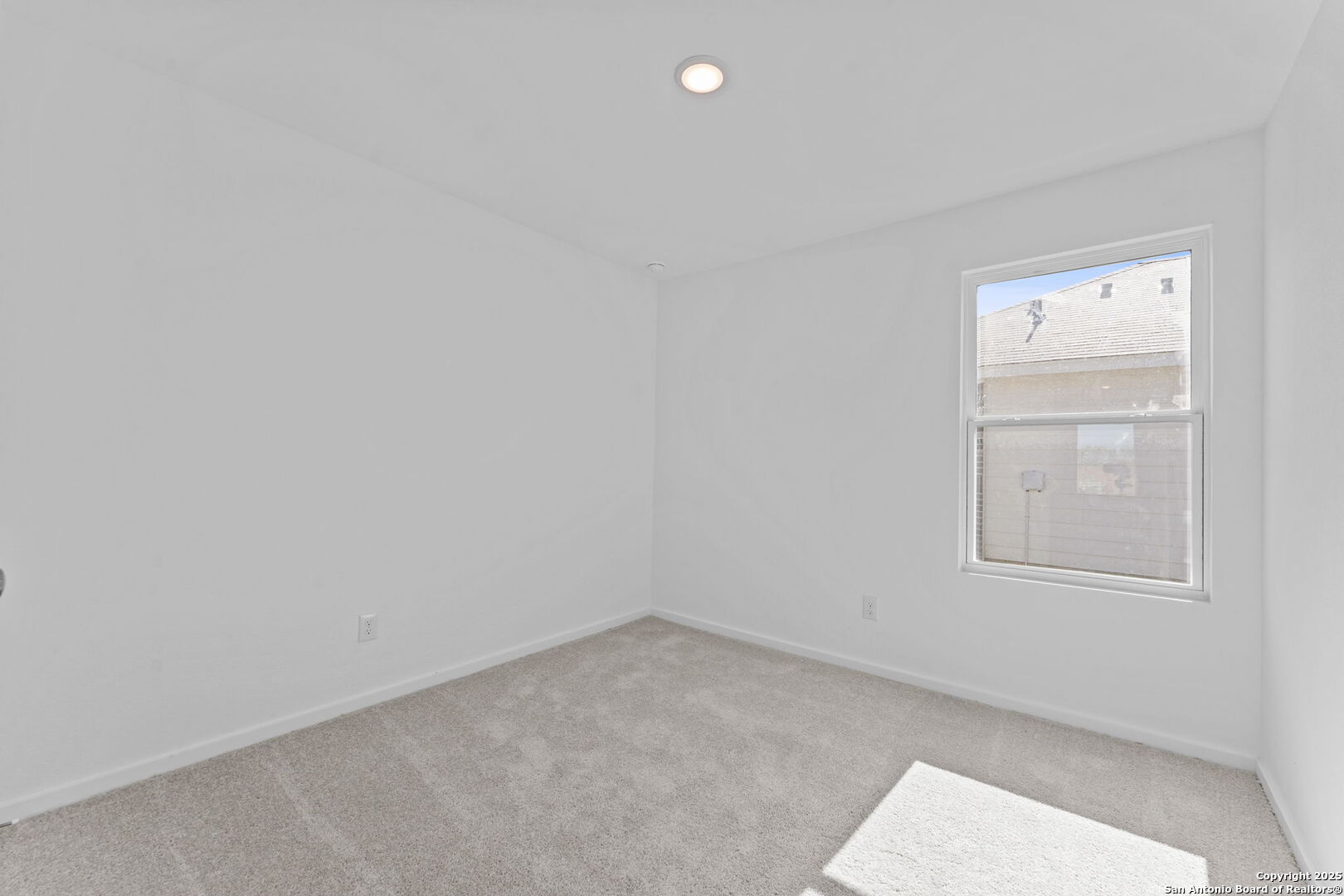 2067 Powell Place Converse, TX 78109 - Photo 5 of 22 an empty room with windows