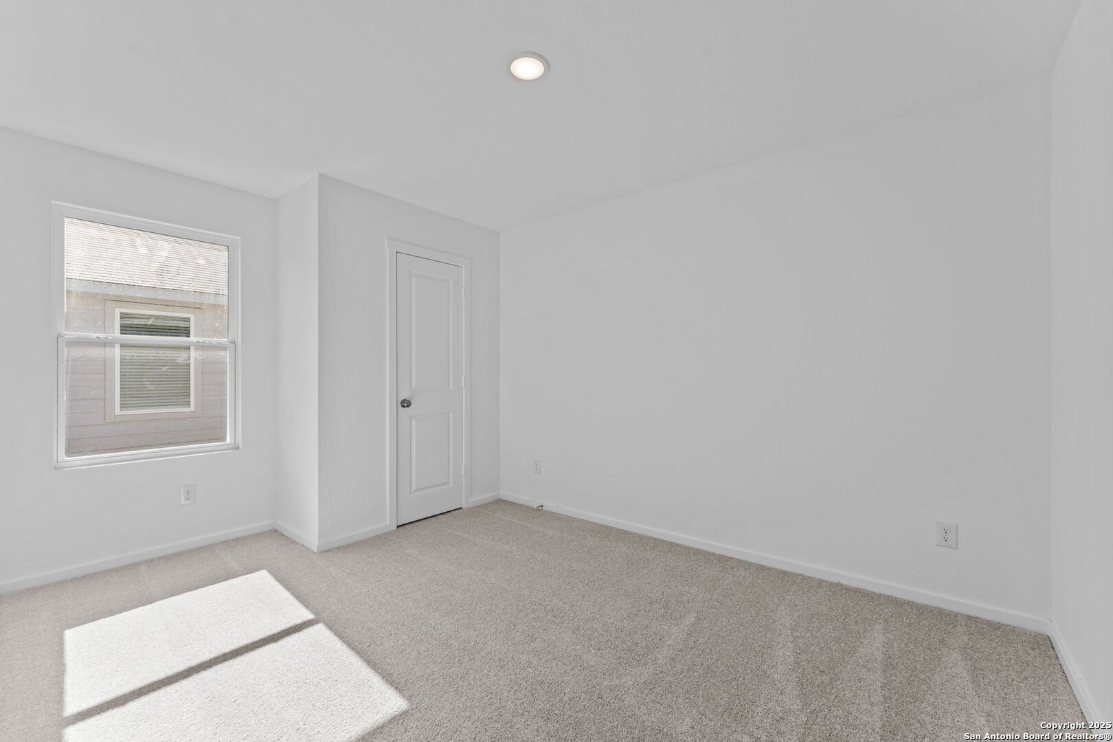 2067 Powell Place Converse, TX 78109 - Photo 9 of 22 an empty room with windows