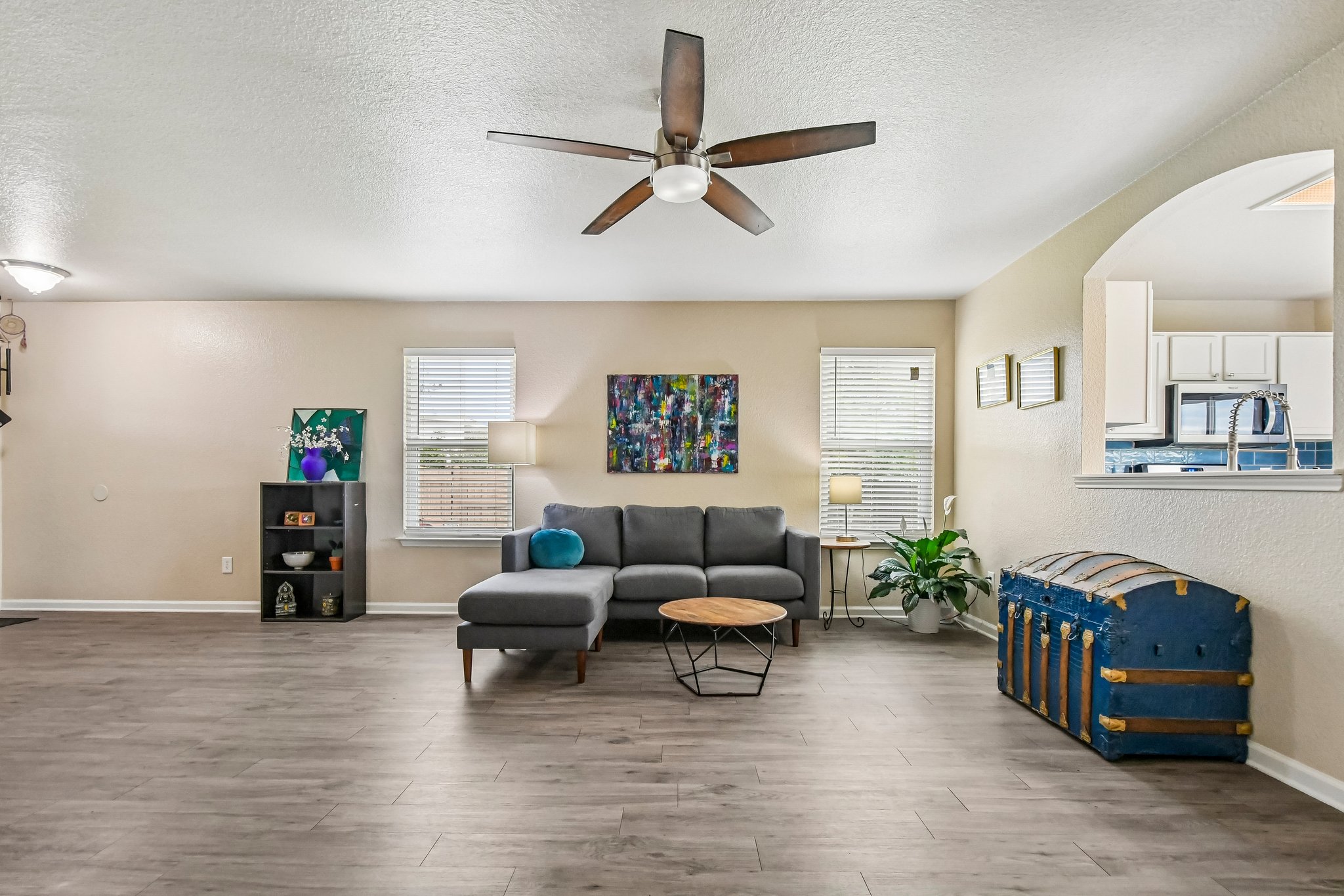 125 Mason Reed Cove Kyle, TX 78640 - Photo 8 of 39 a living room with furniture and a flat screen tv