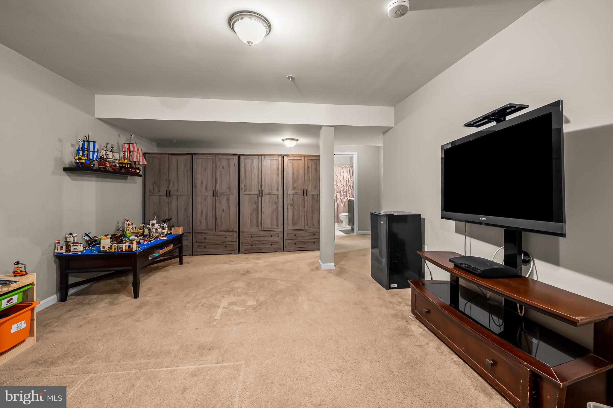 6008 Hanover Road Elkridge, MD 21075 - Photo 30 of 36 a living room with furniture and a flat screen tv