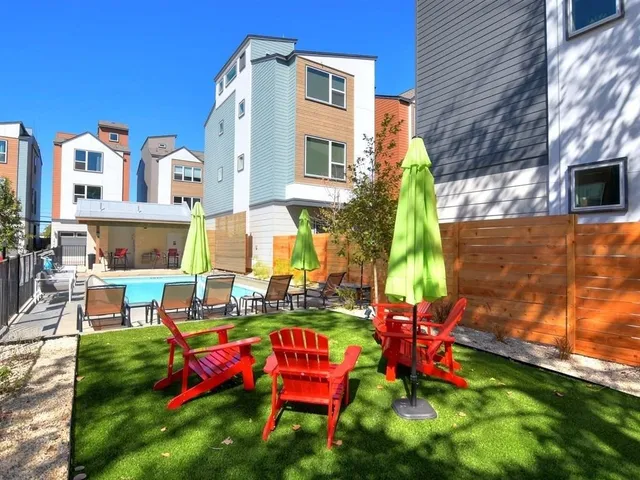 a view of a swimming pool with a lounge chairs