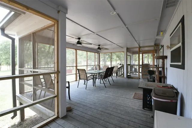 a view of a lake with houses in the background