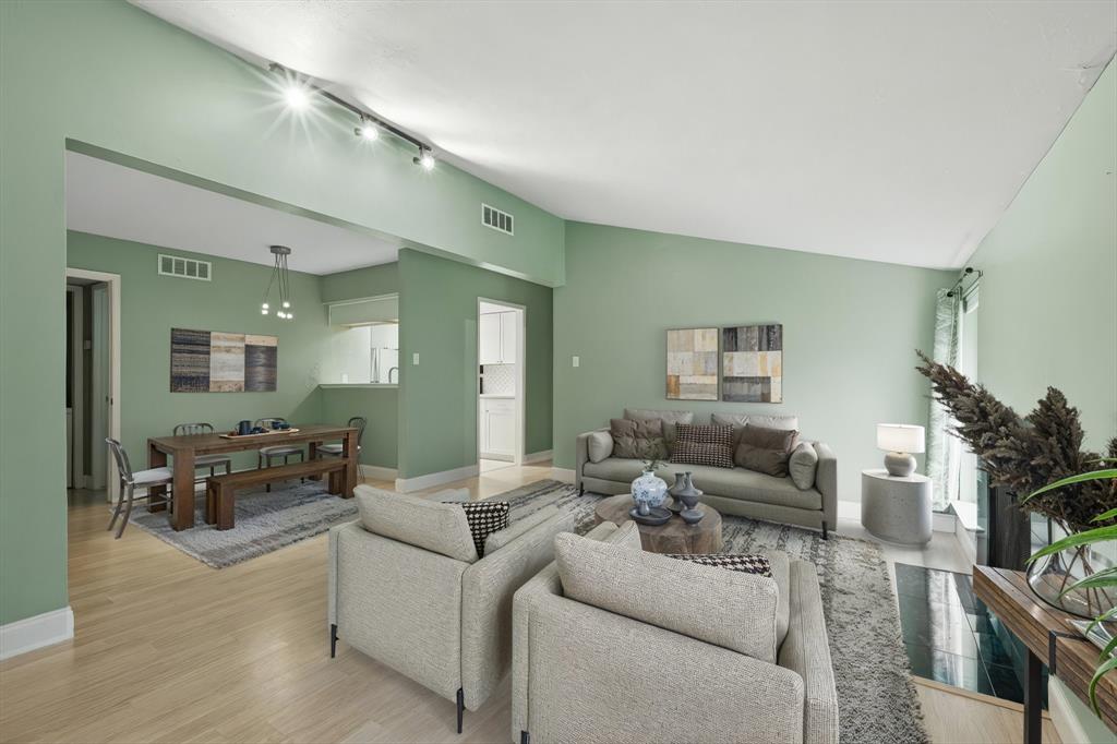 12824 Midway Road, Unit 2136 Dallas, TX 75244 - Photo 6 of 40 a living room with furniture and a couch