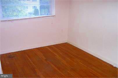 5319 Pooks Hill Road, Unit 1 Bethesda, MD 20814 - Photo 12 of 18 a view of a big room with wooden floor